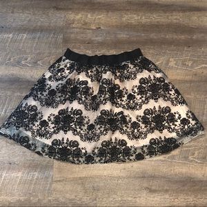 NWOT Express Black and Gold skirt size small!